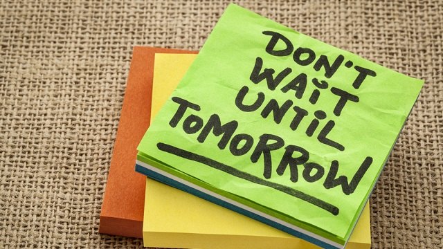 don't wait until tomorrow post-its Shutterstock