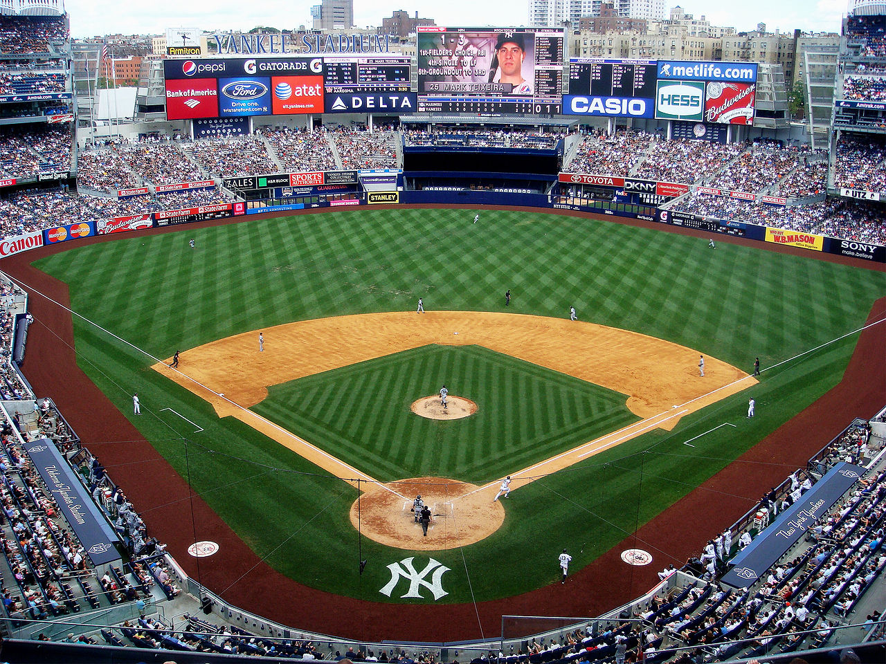 In the shadow of stadium, a Yemen-born Yankee vendor waits out