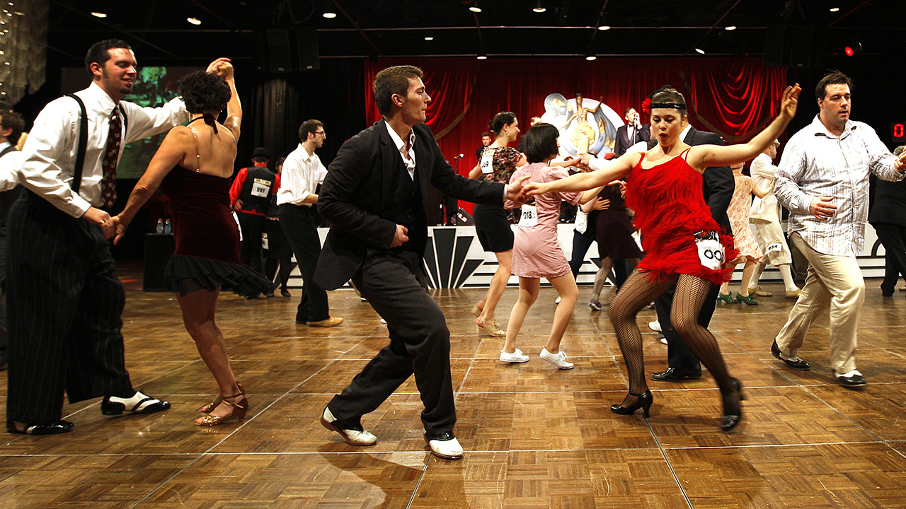 Swing Dance-Off competition to show off their signature dance moves and stamina in Atlantic City, N.J. on Saturday, Jan. 29, 2011. The dance competition is part of Atlantic City’s ongoing commemoration of the city's rich history during the 1920s, and featured the music and dance styles of the 20s-40s. (AP Photo/Tim Larsen) Swing Dance-Off competition to show off their signature dance moves and stamina in Atlantic City, N.J. on Saturday, Jan. 29, 2011. The dance competition is part of Atlantic City’s ongoing commemoration of the city's rich history during the 1920s, and featured the music and dance styles of the 20s-40s. (AP Photo/Tim Larsen)