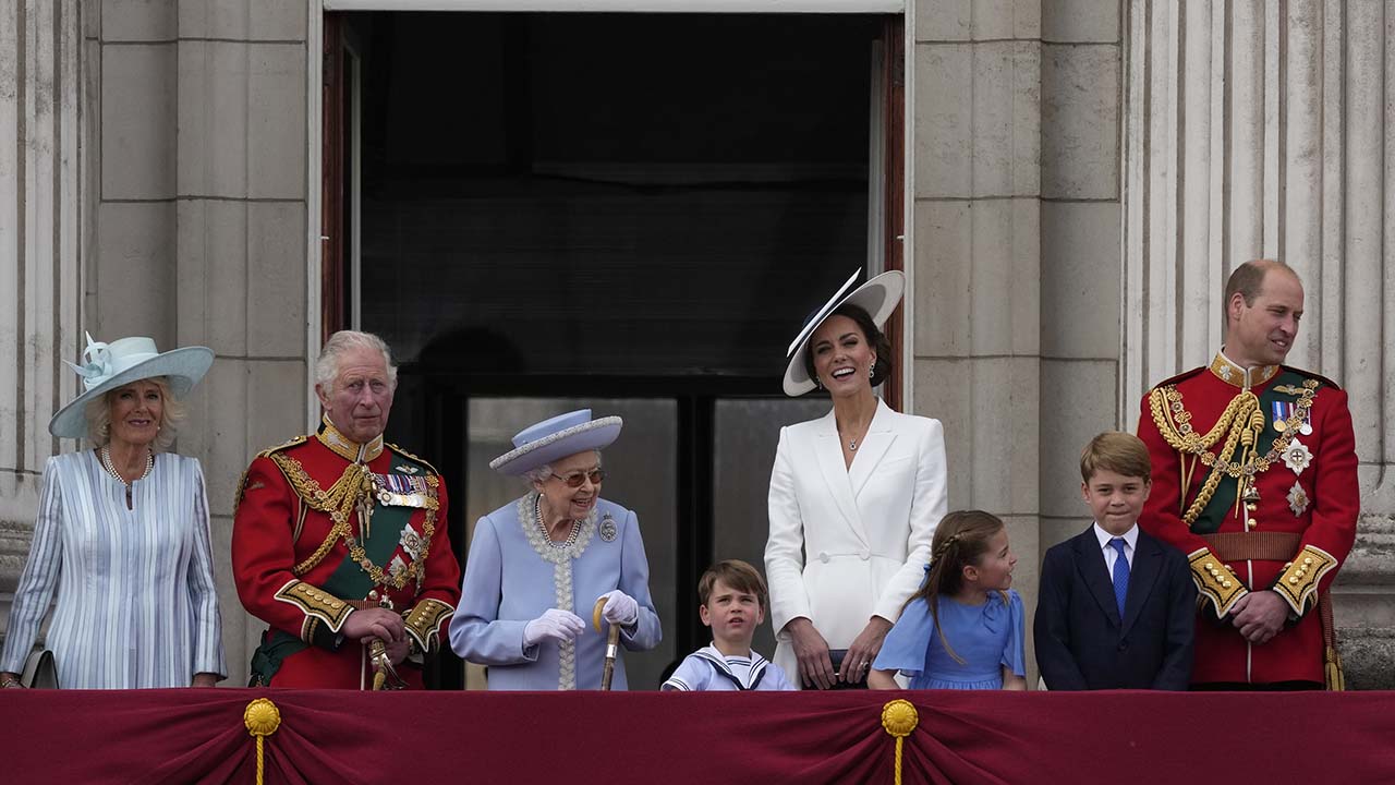 Camilla Duchess of Cornwall, from the left, Prince Charles, Queen Elizabeth II, Prince Louis, Kate, Duchess of Cambridge, Princess Charlotte, Prince George, and Prince William on the balcony of Buckingham Palace, London, June 2, 2022