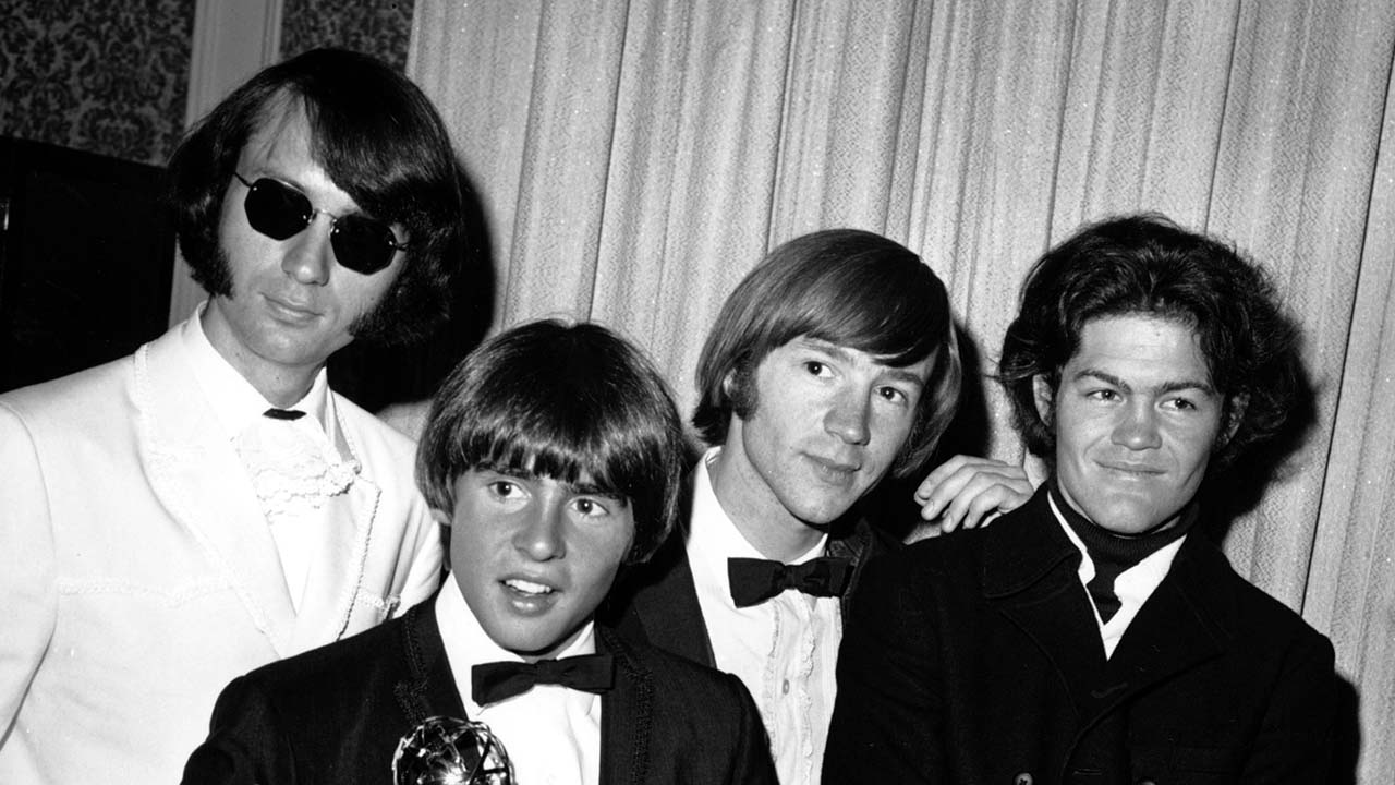 This June 4, 1967 file photo shows The Monkees posing with their Emmy award at the 19th Annual Primetime Emmy Awards in Calif. The group members are, from left to right, Mike Nesmith, Davy Jones, Peter Tork, and Micky Dolenz. (AP Photo, File)