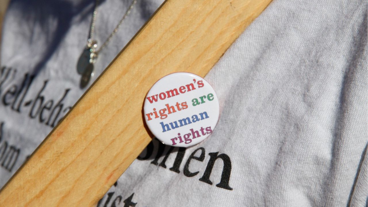 Women's rights are human rights Button with the text "women's rights are human rights"