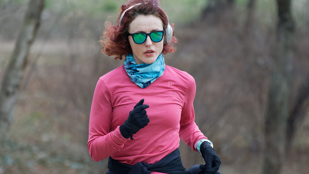 woman with headphones jogging