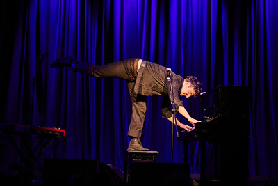 Adam Weiner acrobatics on the piano stool