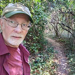 Bob Kauffman proudly stands along one of the many Long Island Greenbelt Trails