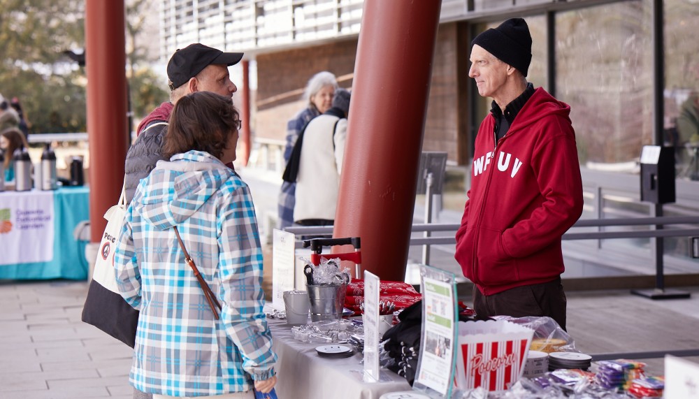 DJ Corny O'Connell with fans (photo by Gus Philippas)